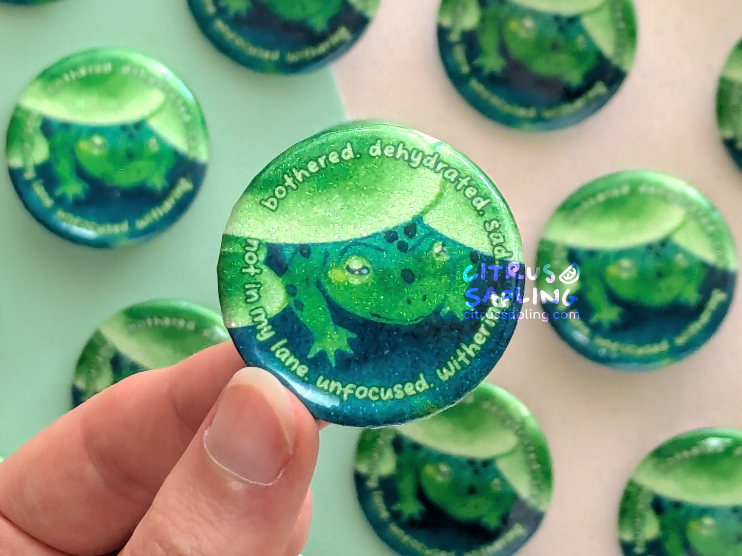 Bothered. Dehydrated. Frog Glitter Badge